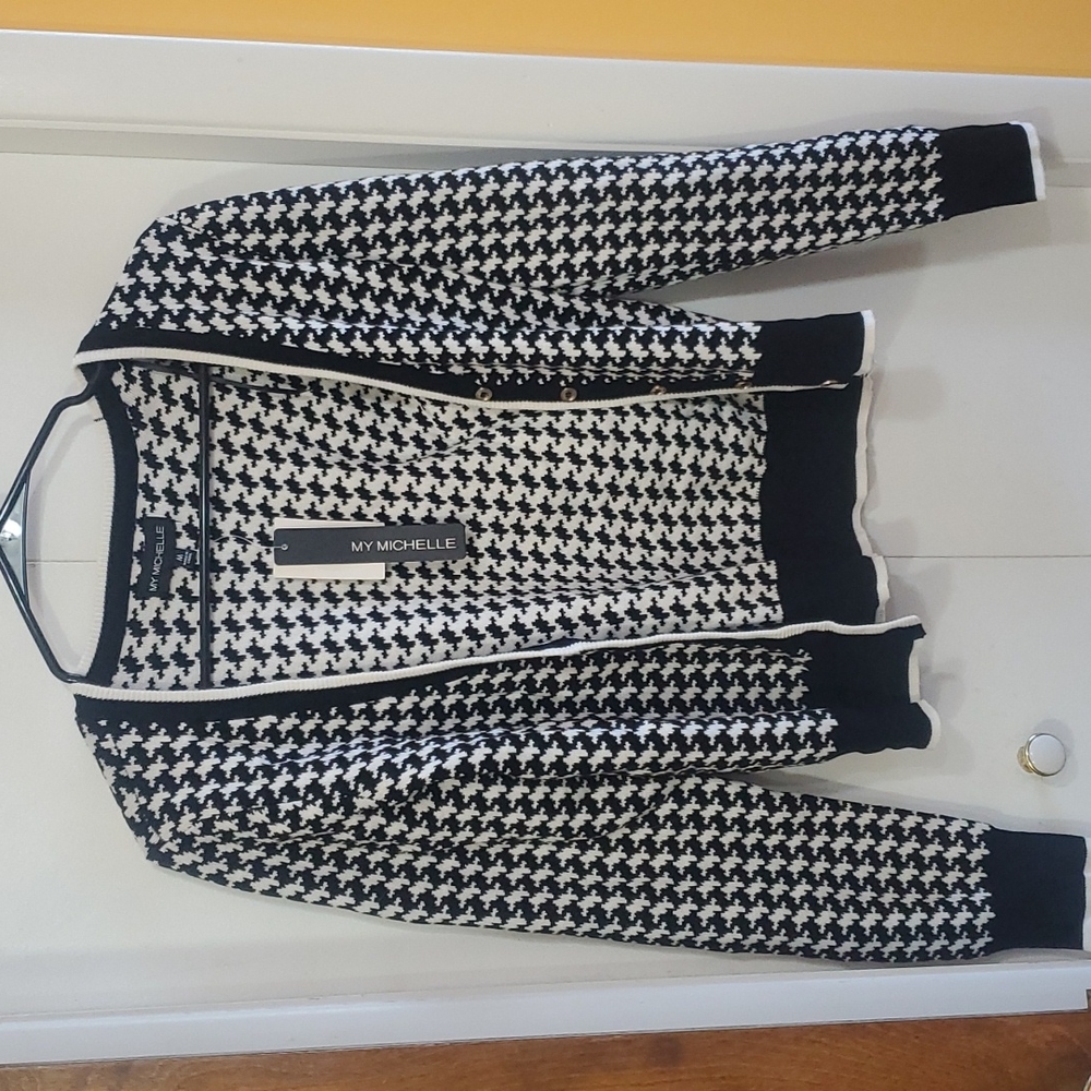 Woman's button up sweater.